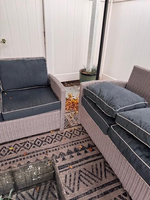 COUCH DIRTY AND OLD LEAVES EVERYWHERE 