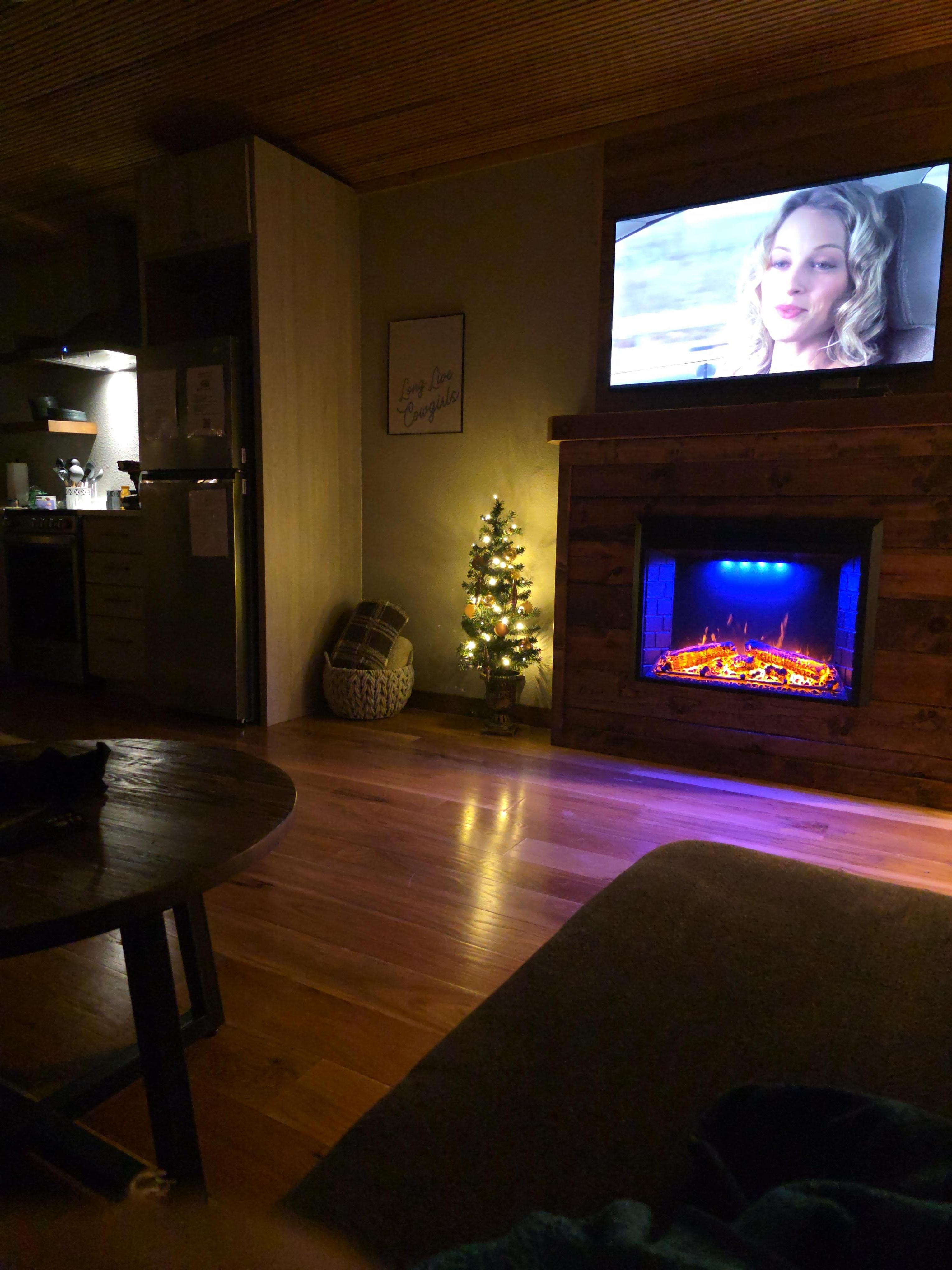 Couch view of living room and kitchen 