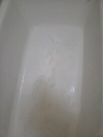 The entire bottom of tub was peeling. Oh and the facet was broken and only luke warm water after 10 minutes of running it.