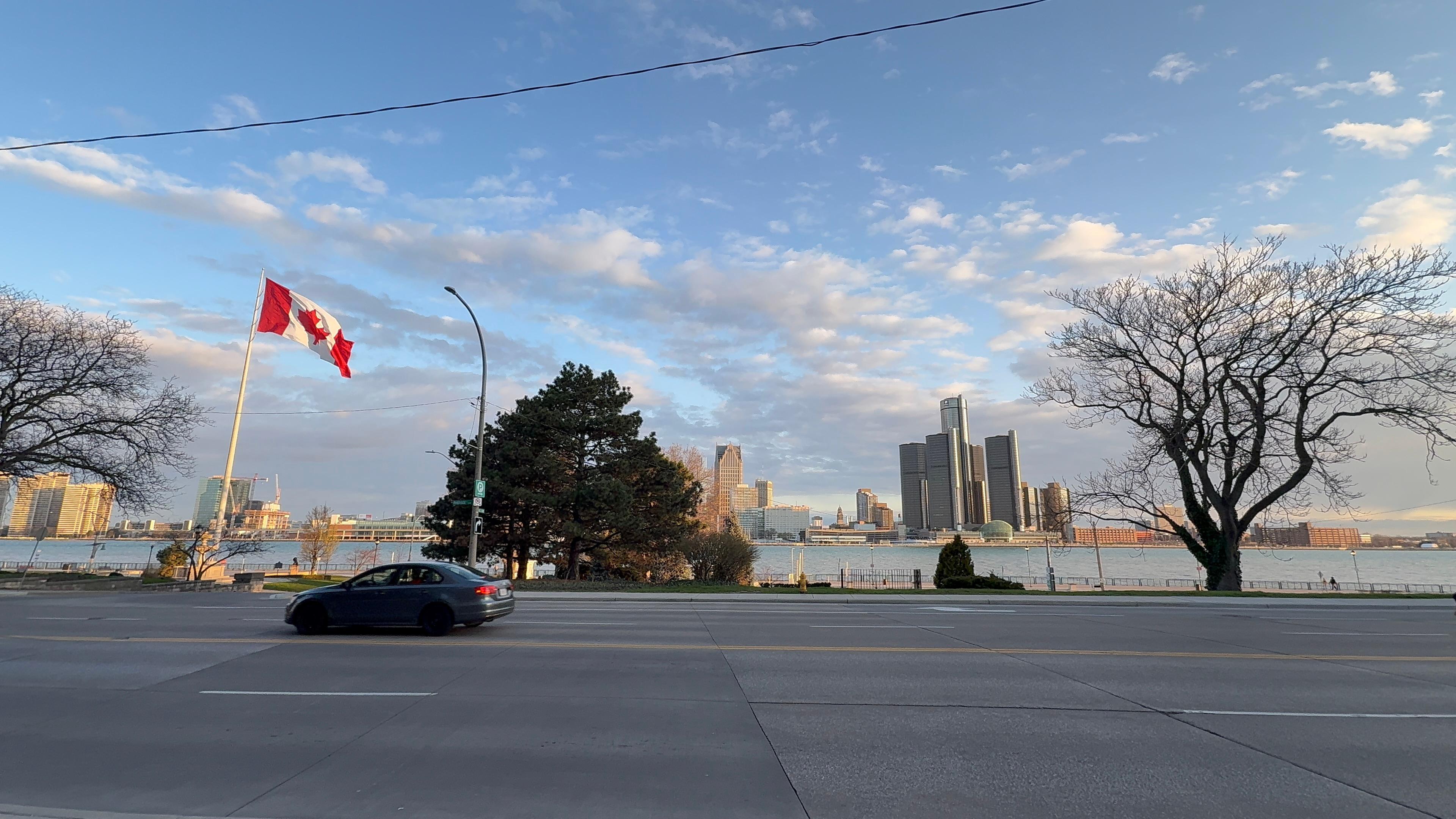 Street/waterfront view - Detroit in distance 