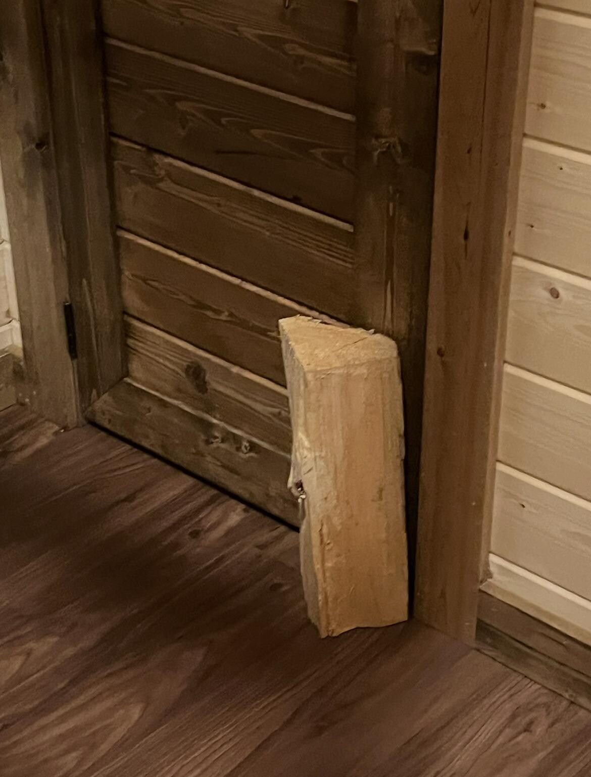 Used a log to close the toilet door