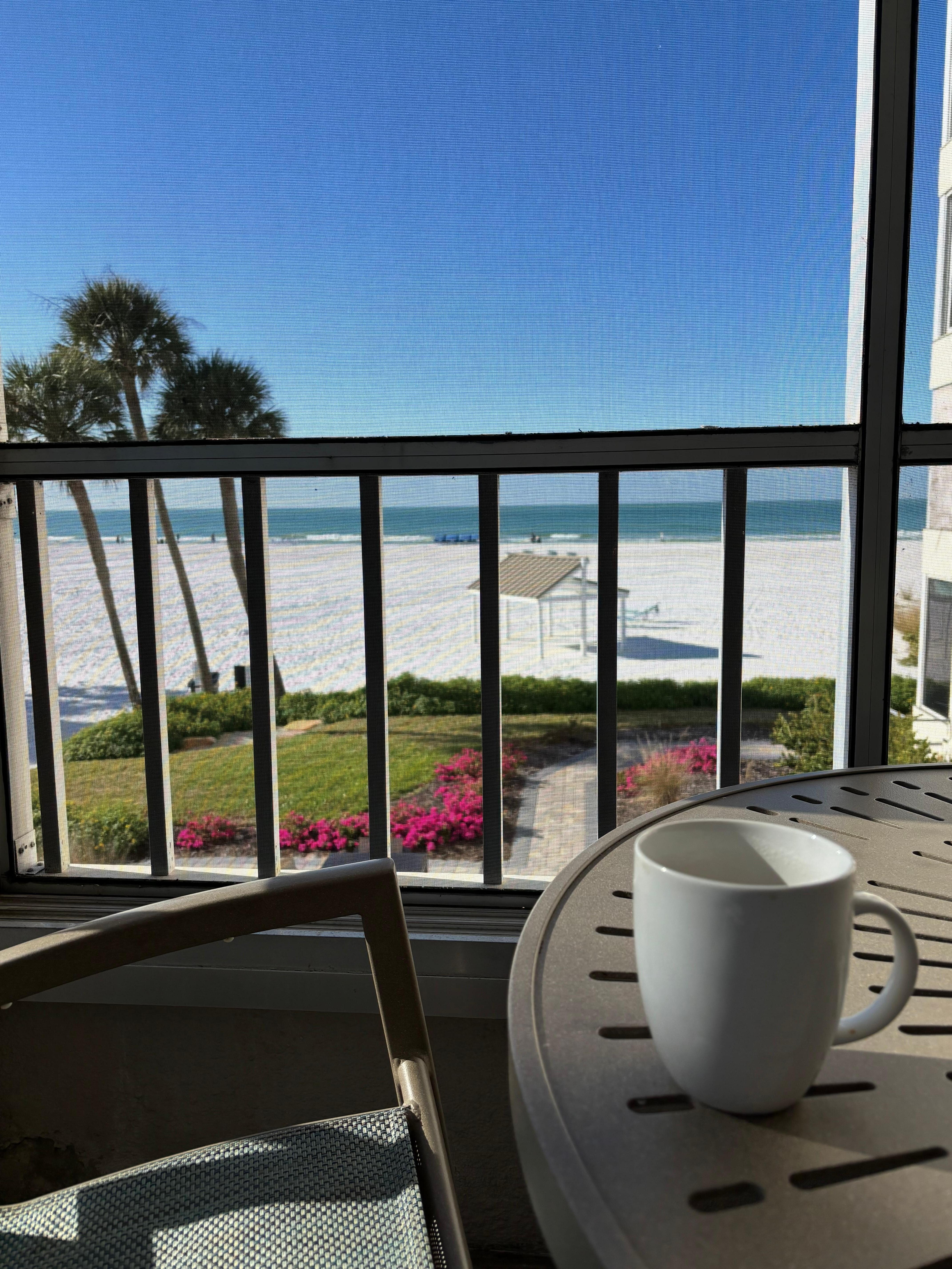 Coffee from porch in morning!  Great view of beach!