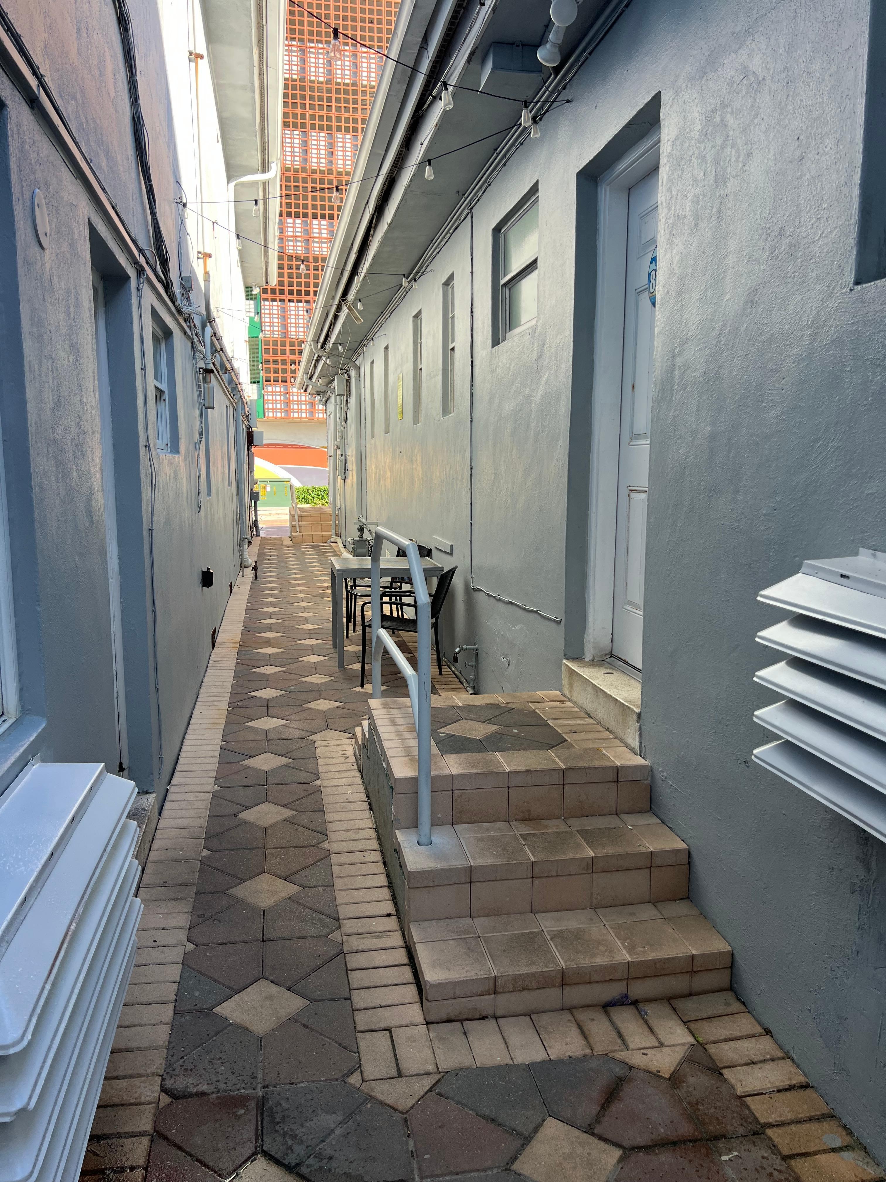 Room located in back of alley. 