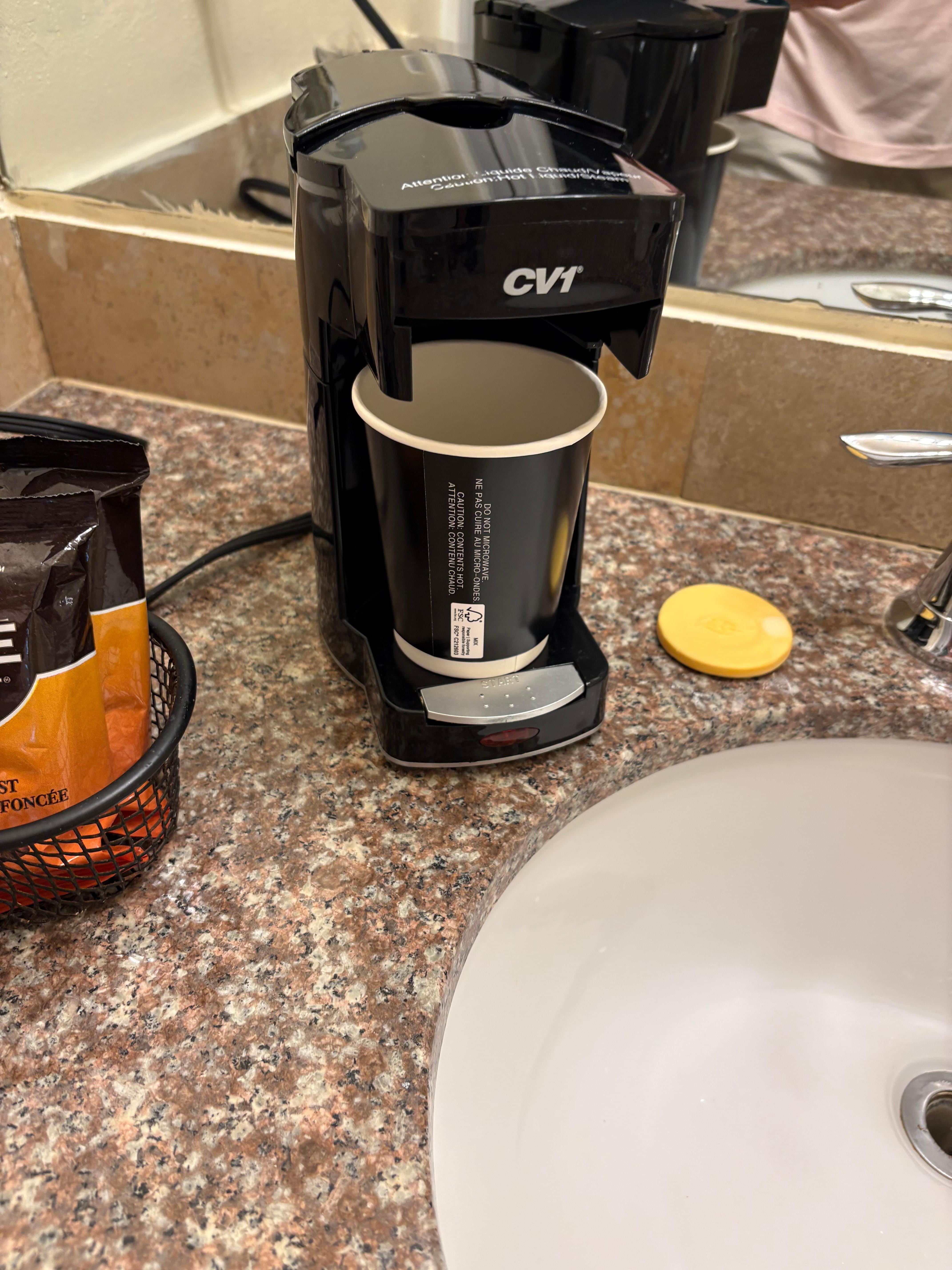 Pod holder free coffee maker