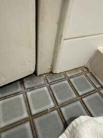 Chipping old paint and grubby corner