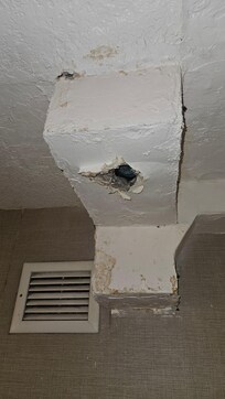 Located on hallway ceiling