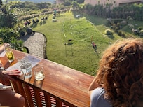 Sitting at the restaurant/bar for happy hour sunset!