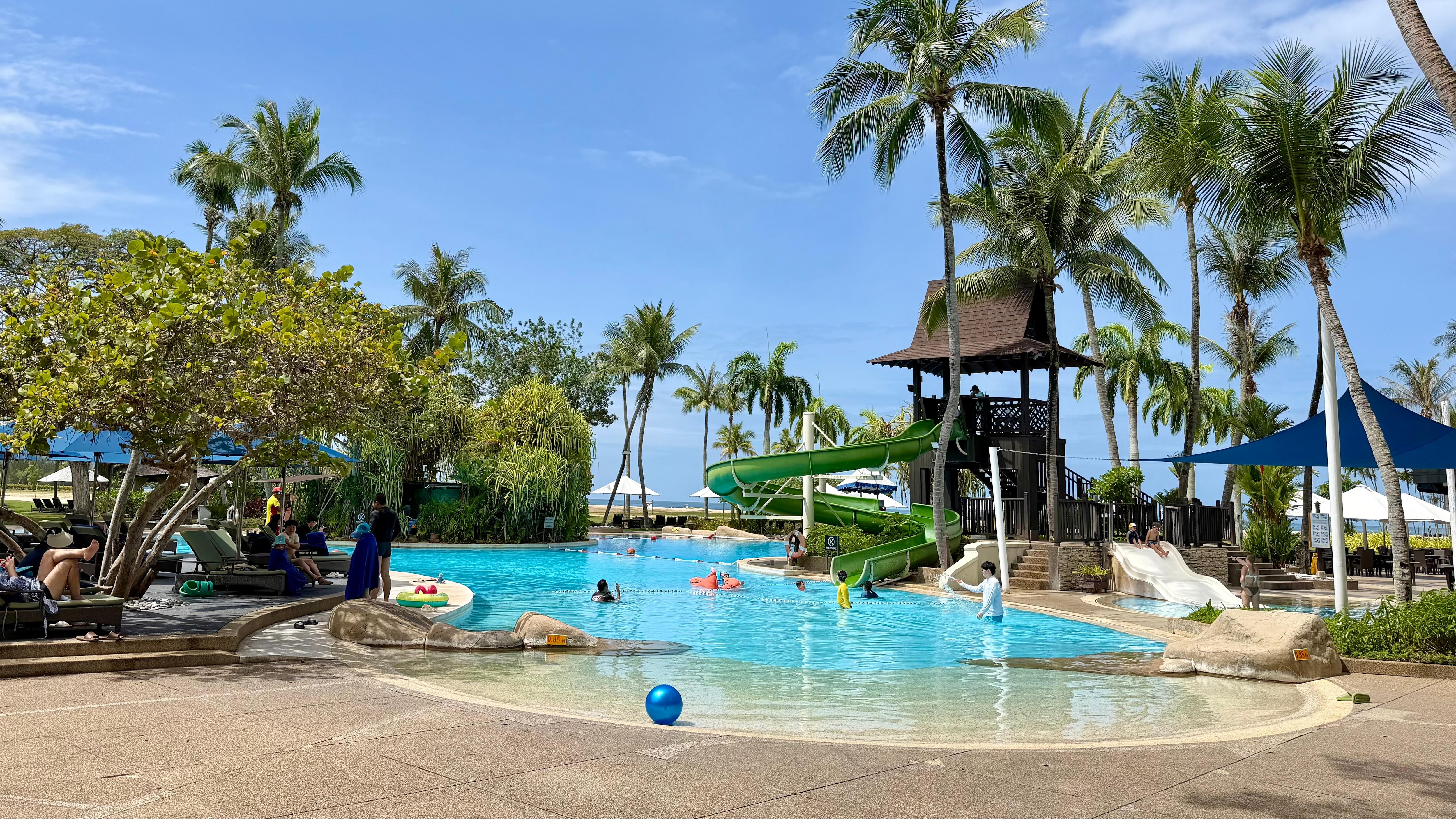 cluster of swimming pools facing the beach front with f&b support 