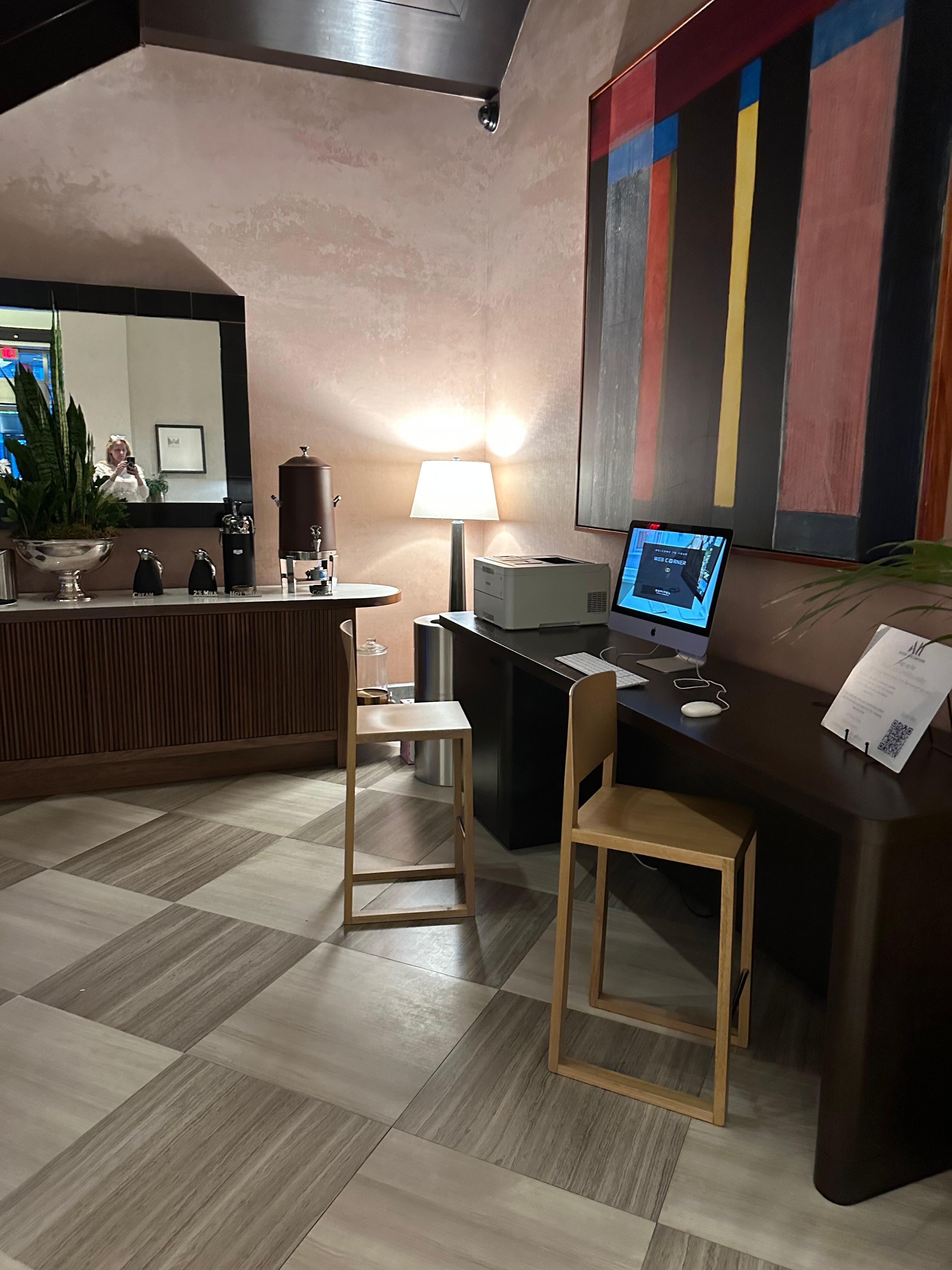 The business center in an alcove of the lobby in the back