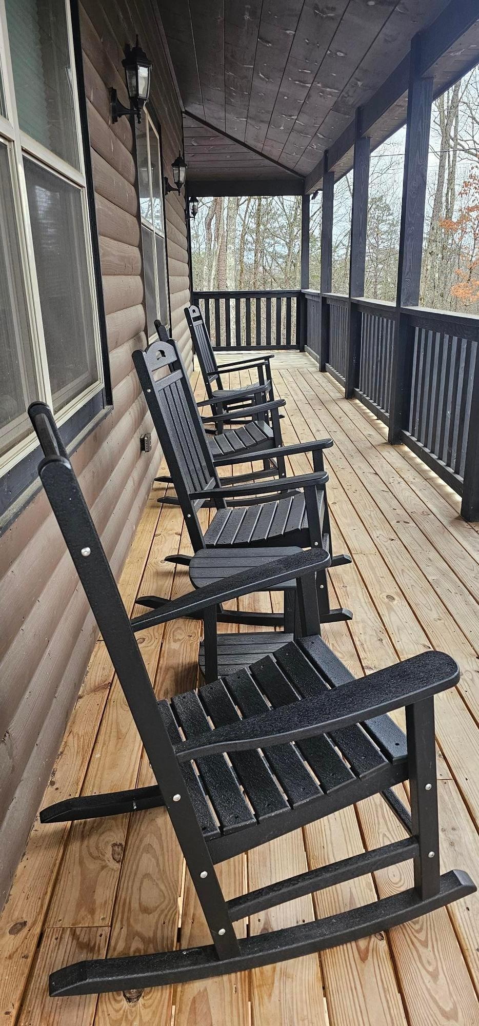 Relaxing porch complete with rocking chairs.