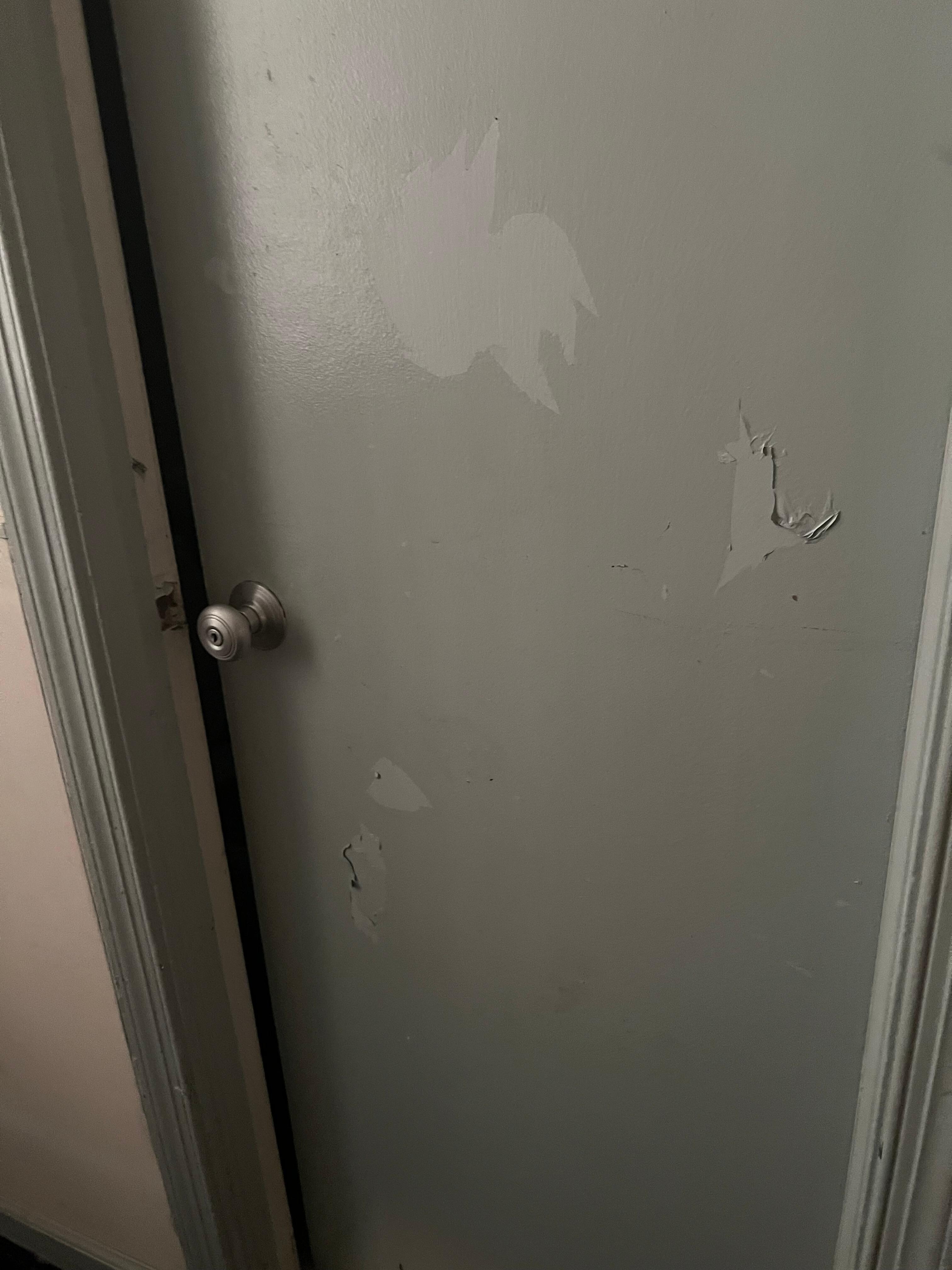 Pealed paint on bathroom door that didn’t close