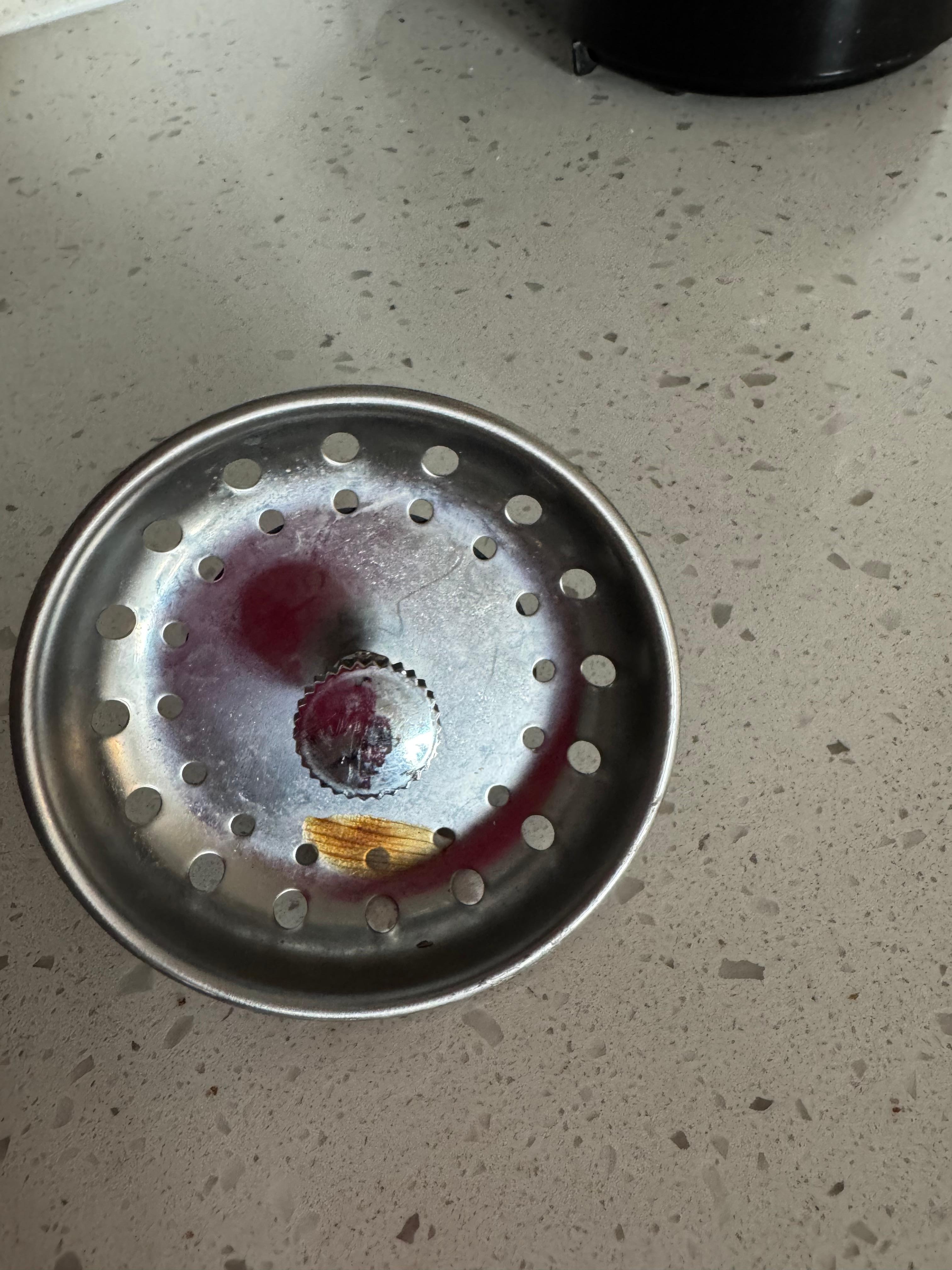 Onion peel on strainer