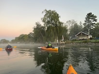 Kayaking by the house in the early morning