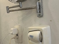 rusty mirror, cracks around outlet