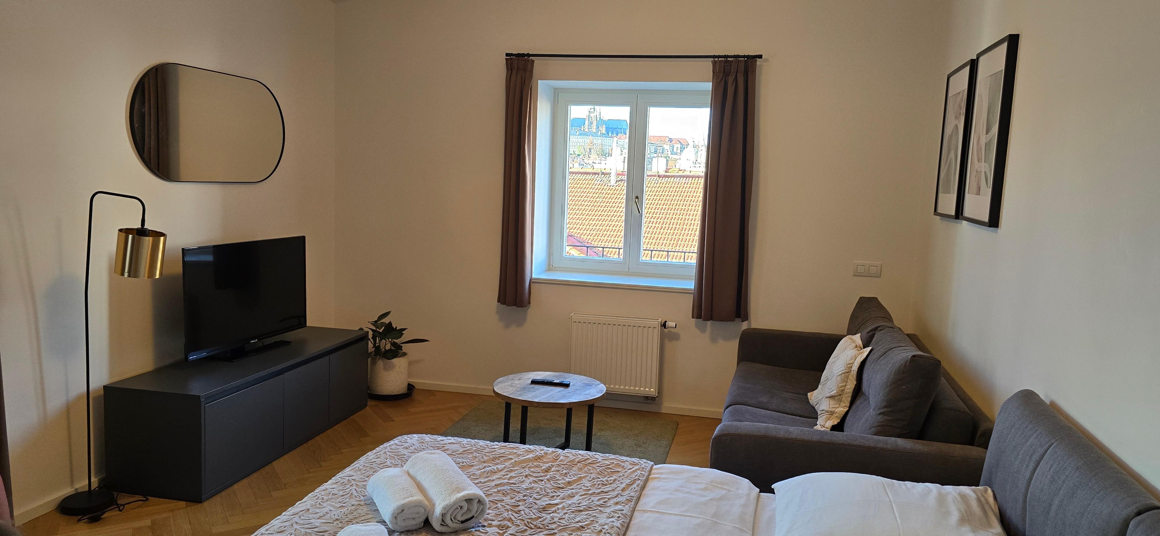 Wohnzimmer mit Doppelbett