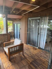 Shared deck looking right into the bedroom