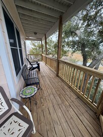 3rd level deck seating to the left. Just outside of Sitting room area with the double bed.