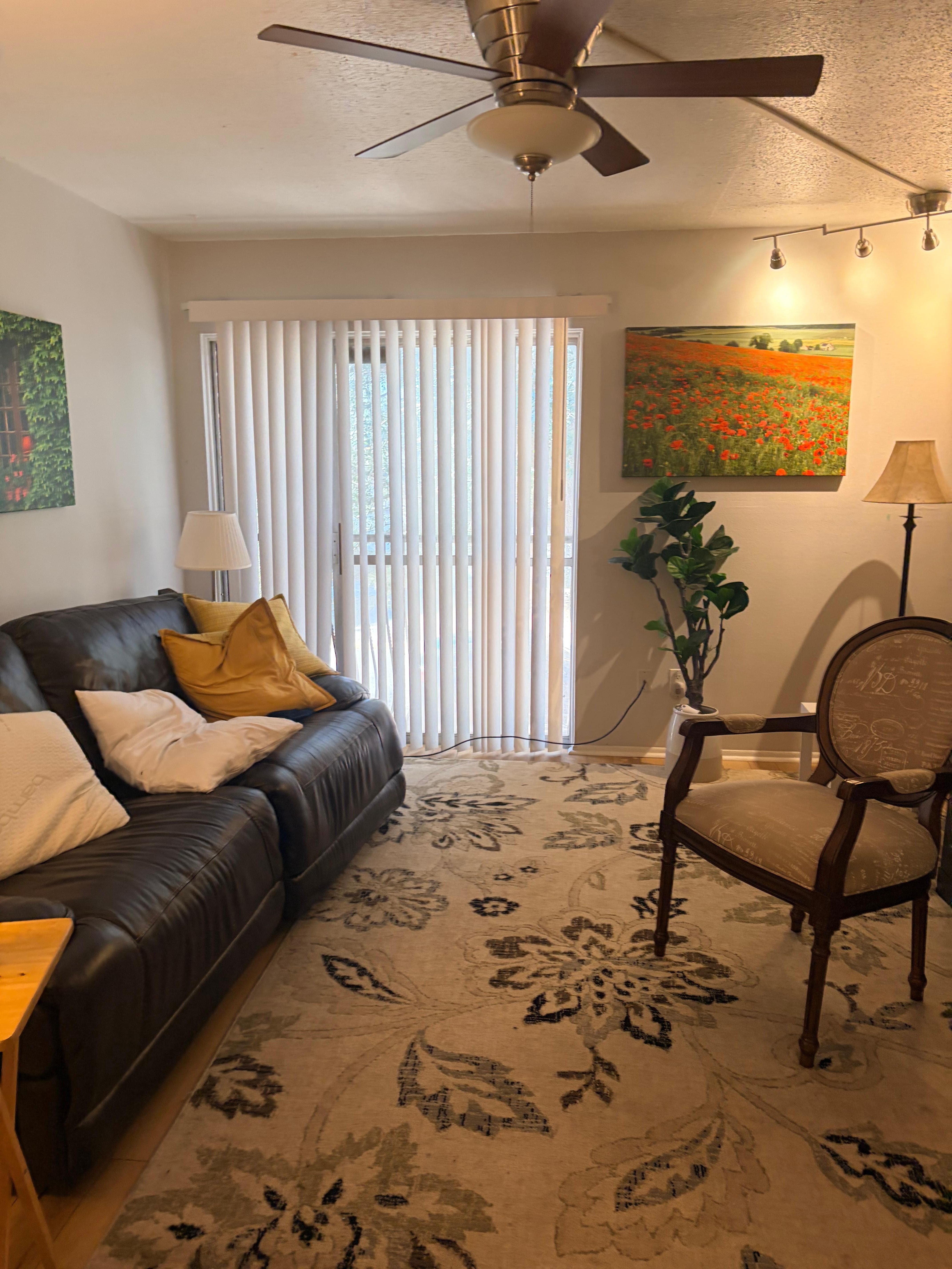 Living room sofa is roomy and reclines 