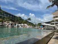 Poolside. One entire side of the pool down by the beach and is reserved solely for travel club members, but most days if you are at the pool before noon, you have no problem getting a good seat with an umbrella.