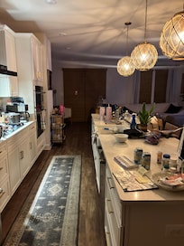 Wanted to give another view of her kitchen with the massive island. All new appliances and opens into living room. ❤️