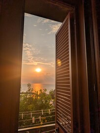Sunset from villa patio (view from one of the bedrooms)