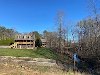 View from pond. Home is back right