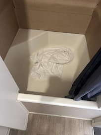 Dirty towel in shower