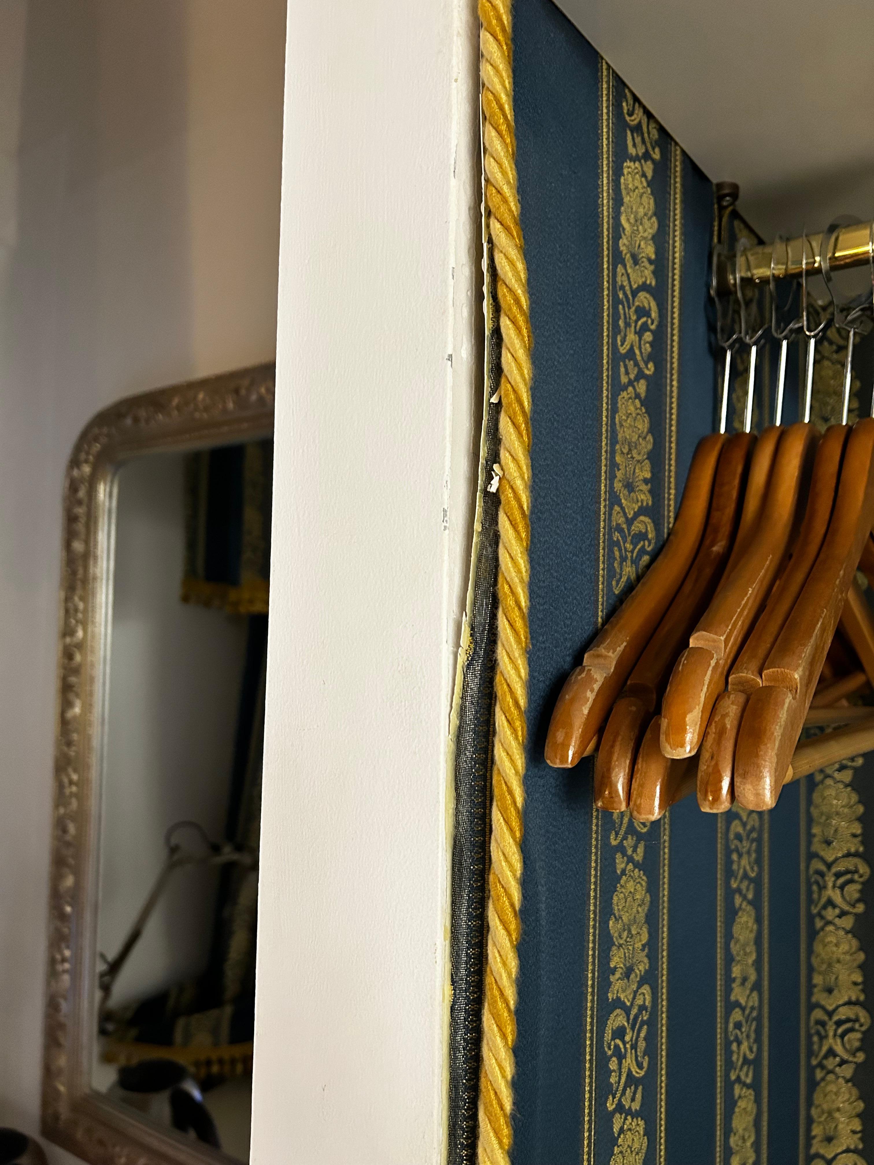 Gold trip badly glued onto basic timber furniture