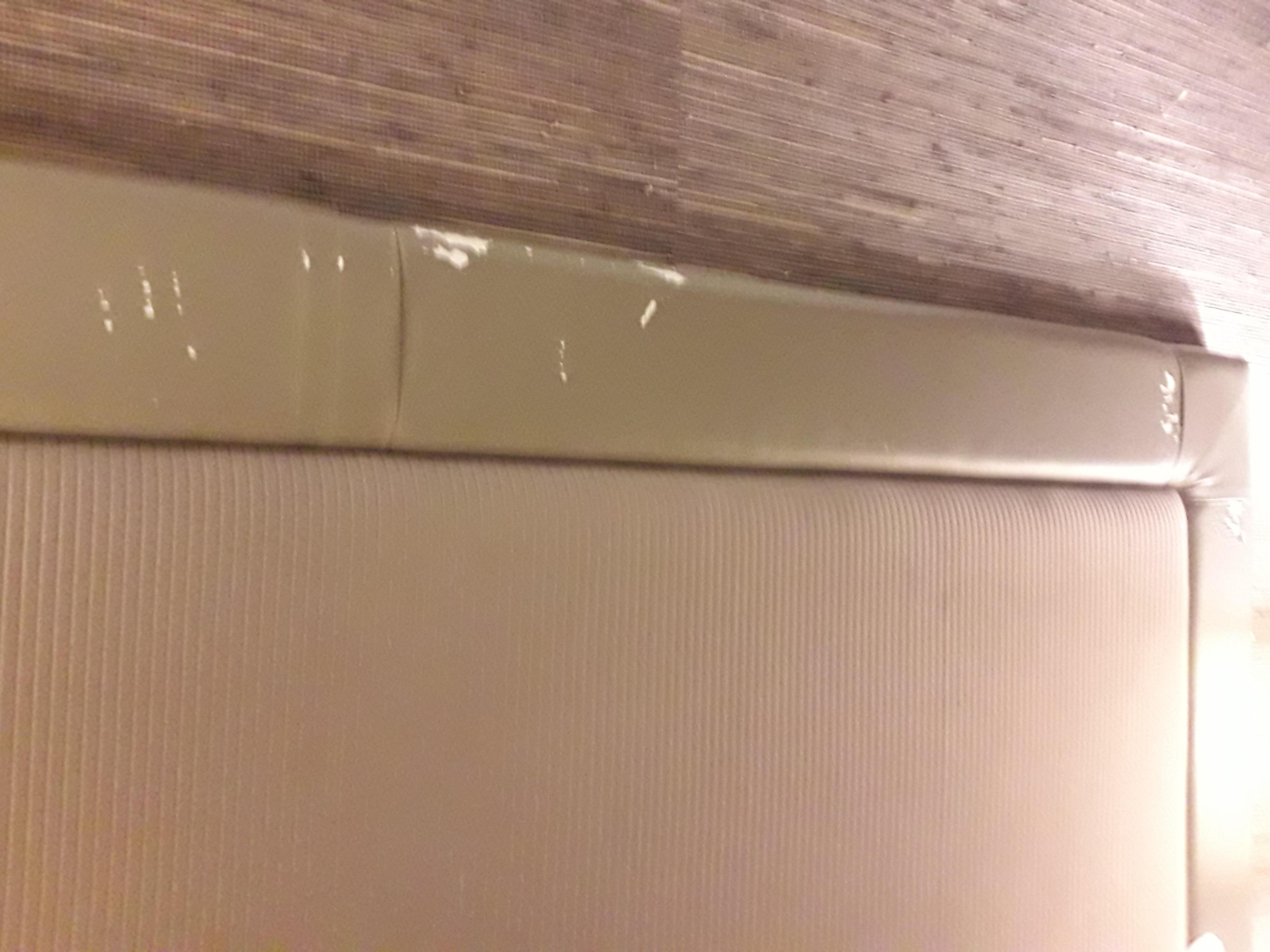 Damaged/shabby headboard 