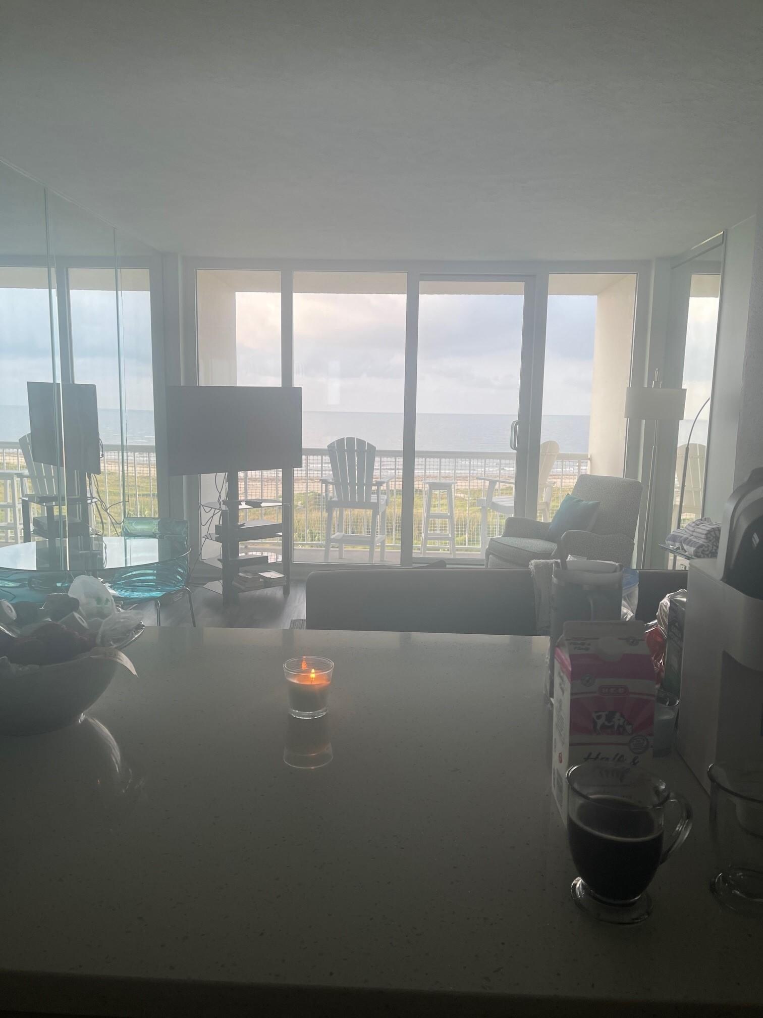 The view standing in the kitchen looking outside.