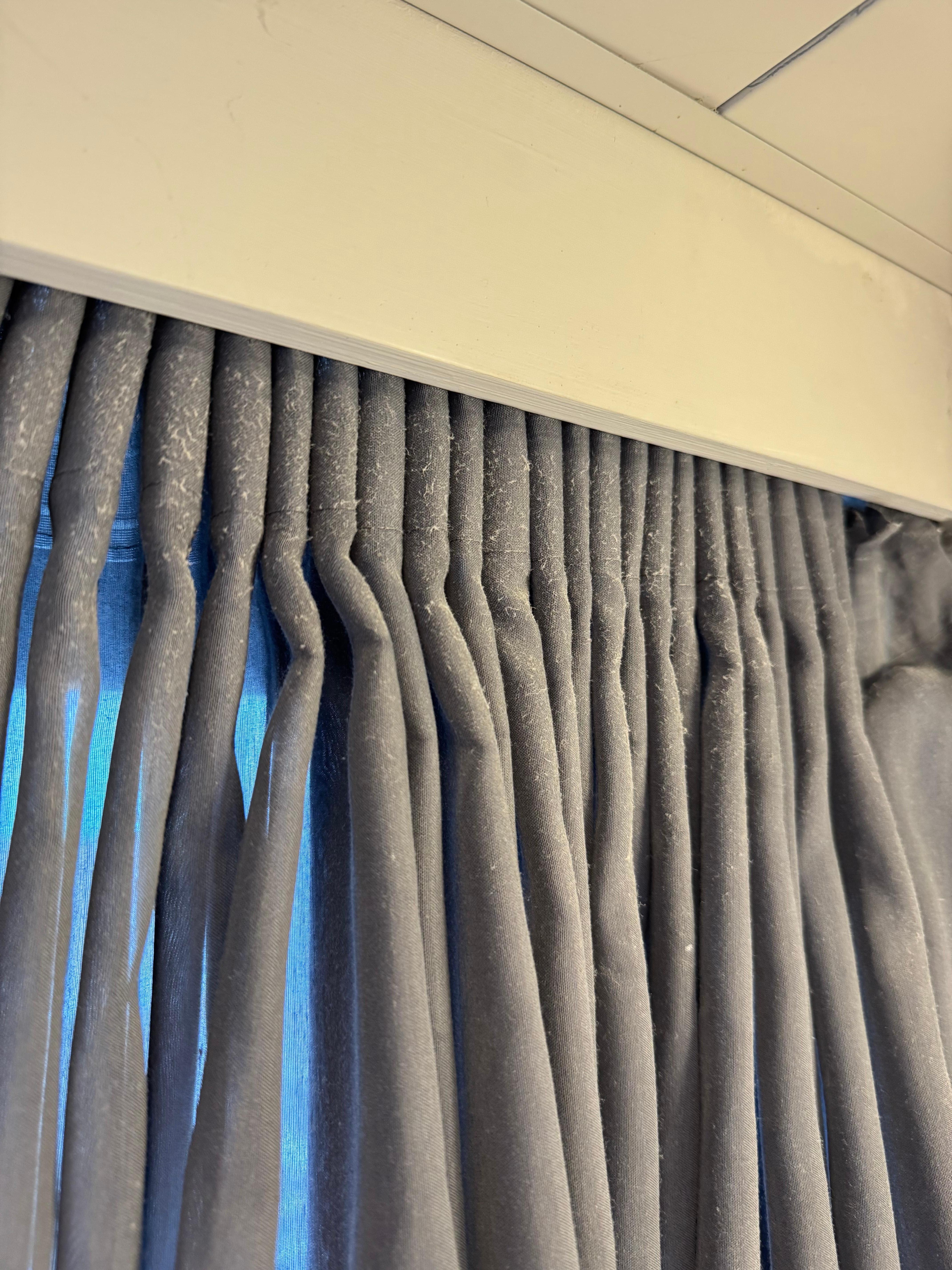 Layer of dust on curtains 