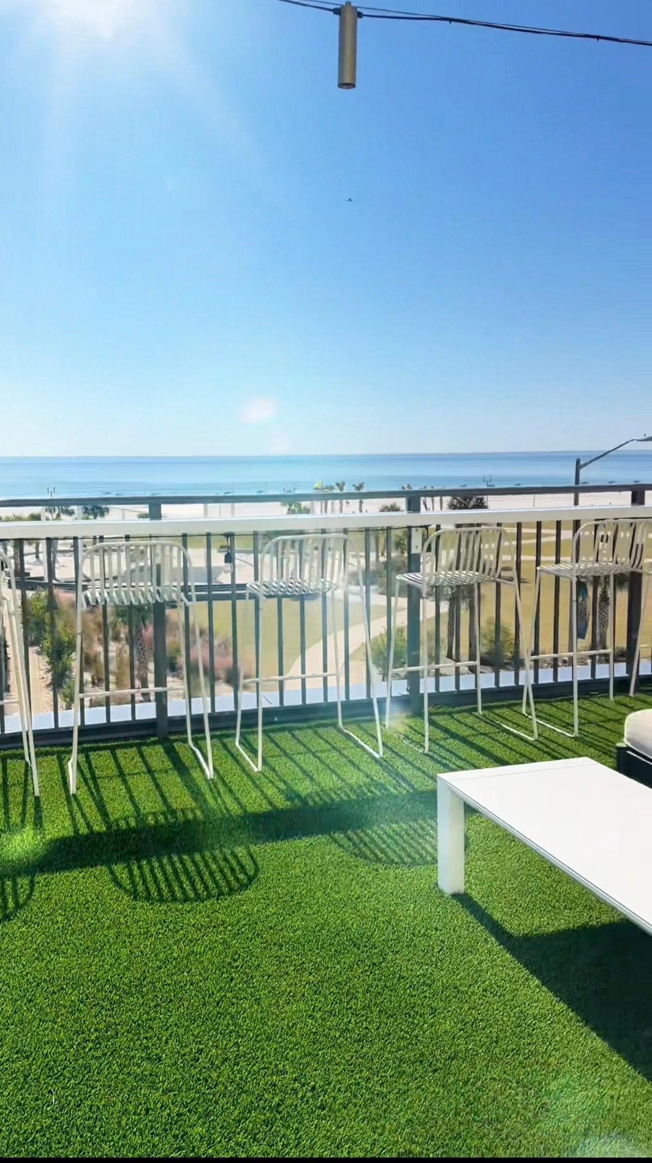 Outside on the 2nd level - on the turf area