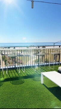 Outside on the 2nd level - on the turf area