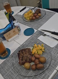 Everything needed to cook a nice dinner in the well stocked kitchen and cute dining table.