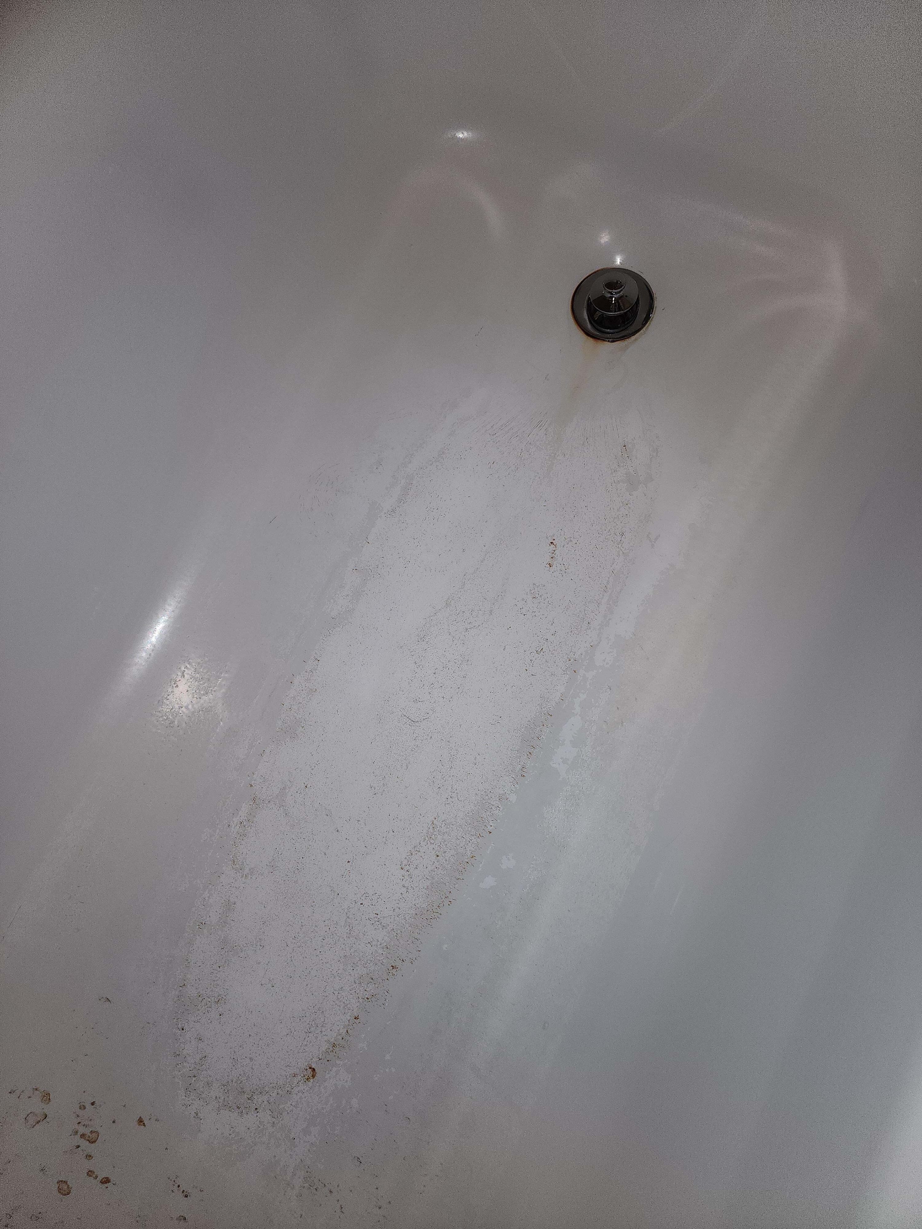 The bathtub that was supposedly cleaned.