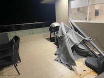 Balcony with broken umbrella