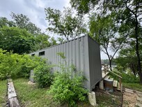 Yep, it's a shipping container! But so warm and friendly inside.