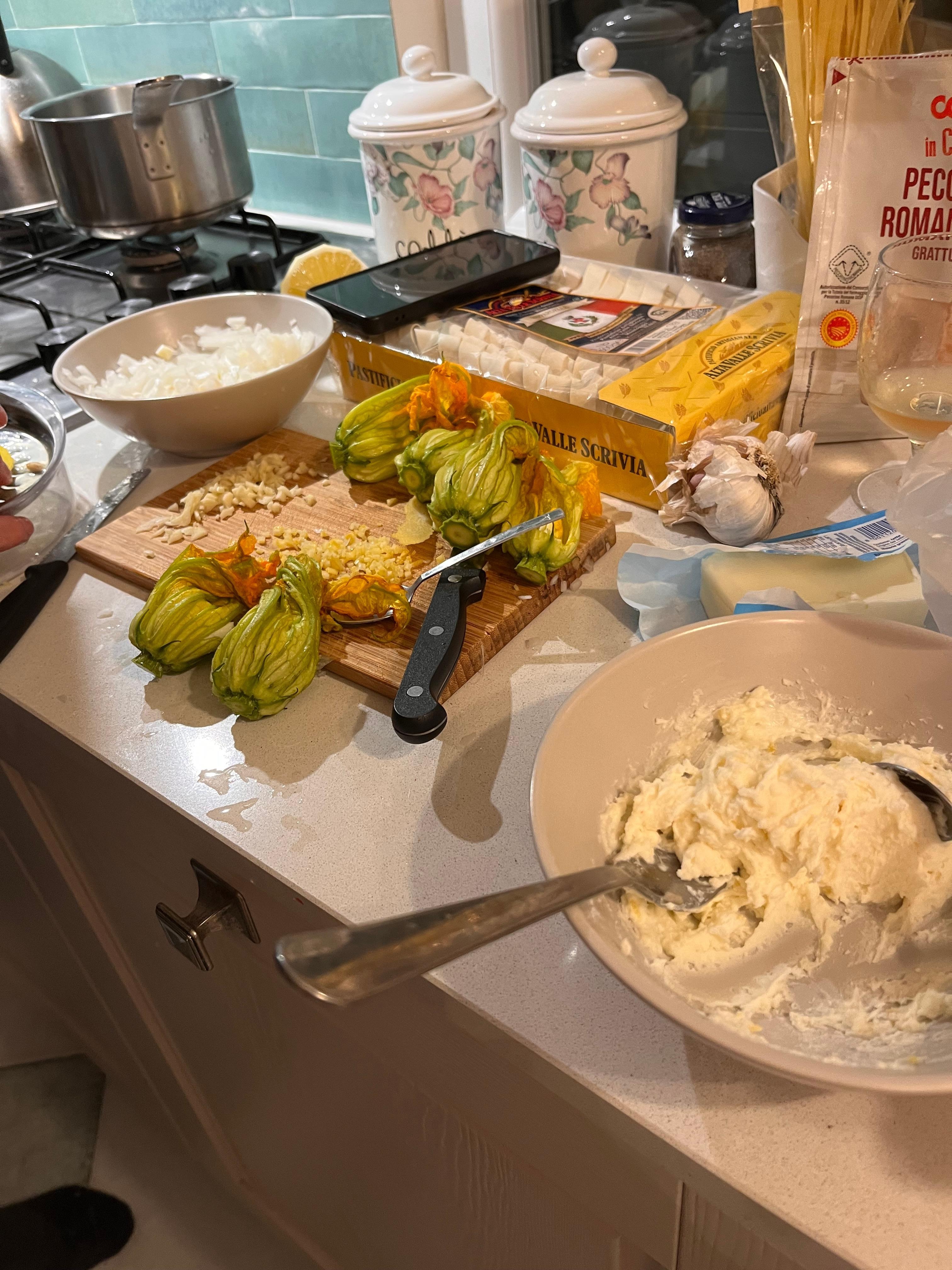 Preparing stuffed zucchini flowers in the apartment