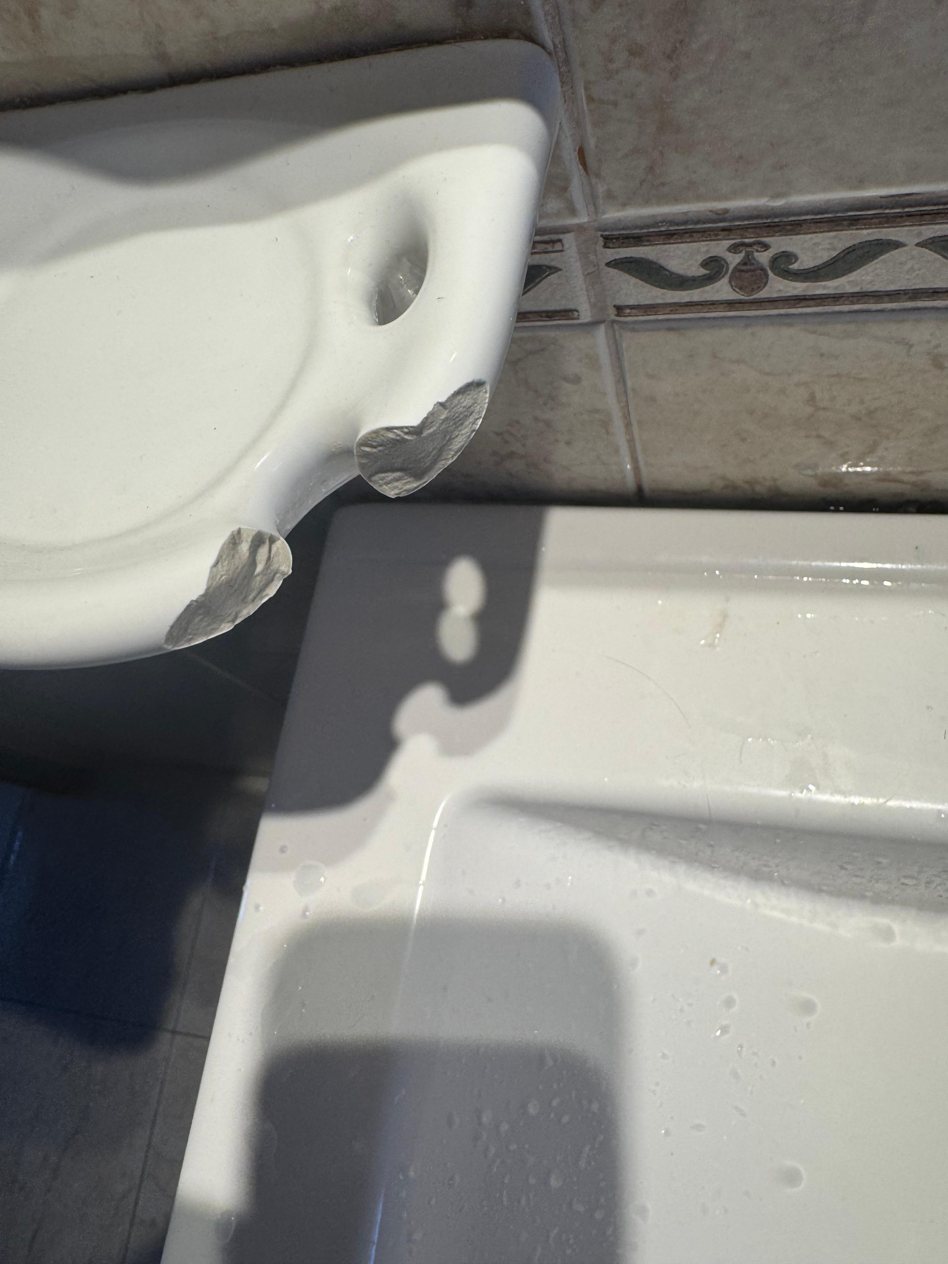 Broken sharp porcelain in the bathroom