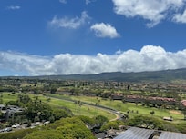 gentle green fairways to the north,