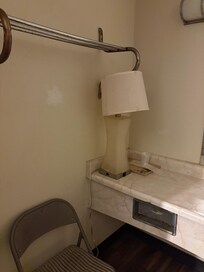 Vanity light belonged on bedside table.