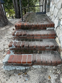 Steps going into the cabin with no railing