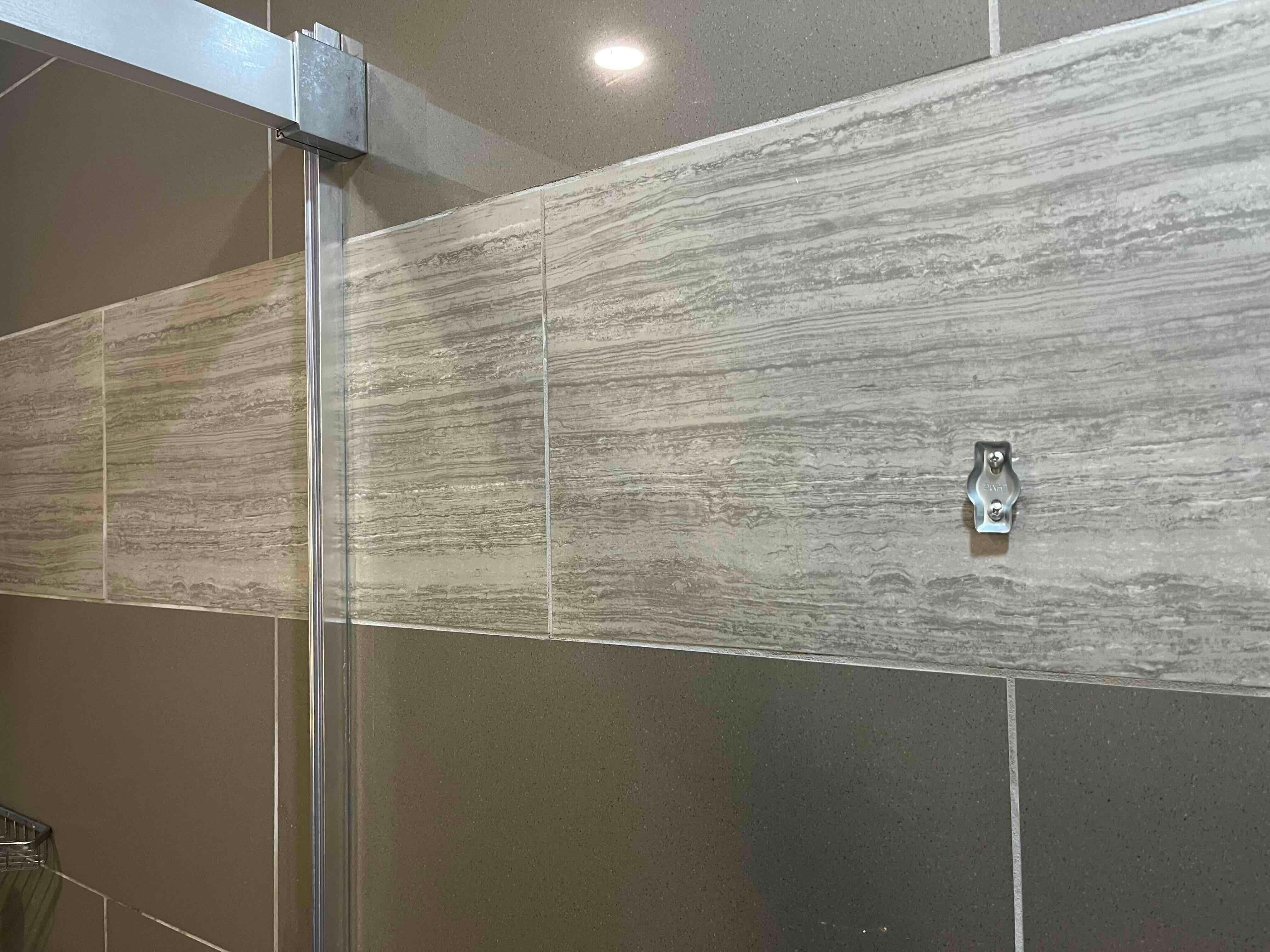 Towel hook apparently fell off and was never replaced