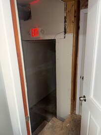 Fire exit hallway that connected to other apartments.