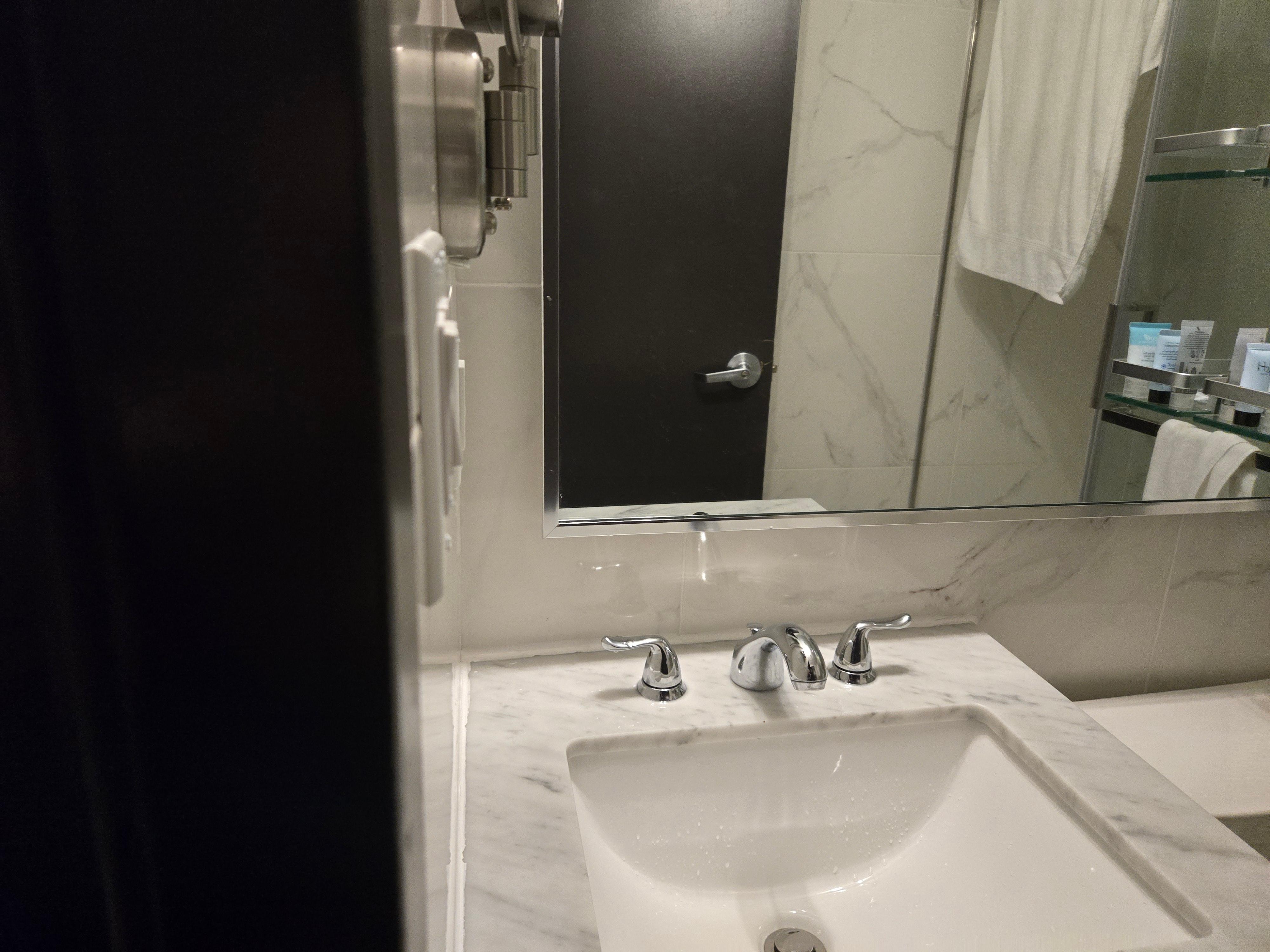 Bathroom sink, no hand soap.