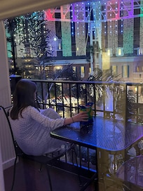 People watching in our PJ’s on the balcony.