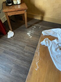 Ceiling falling into room from obvious repaired ceiling