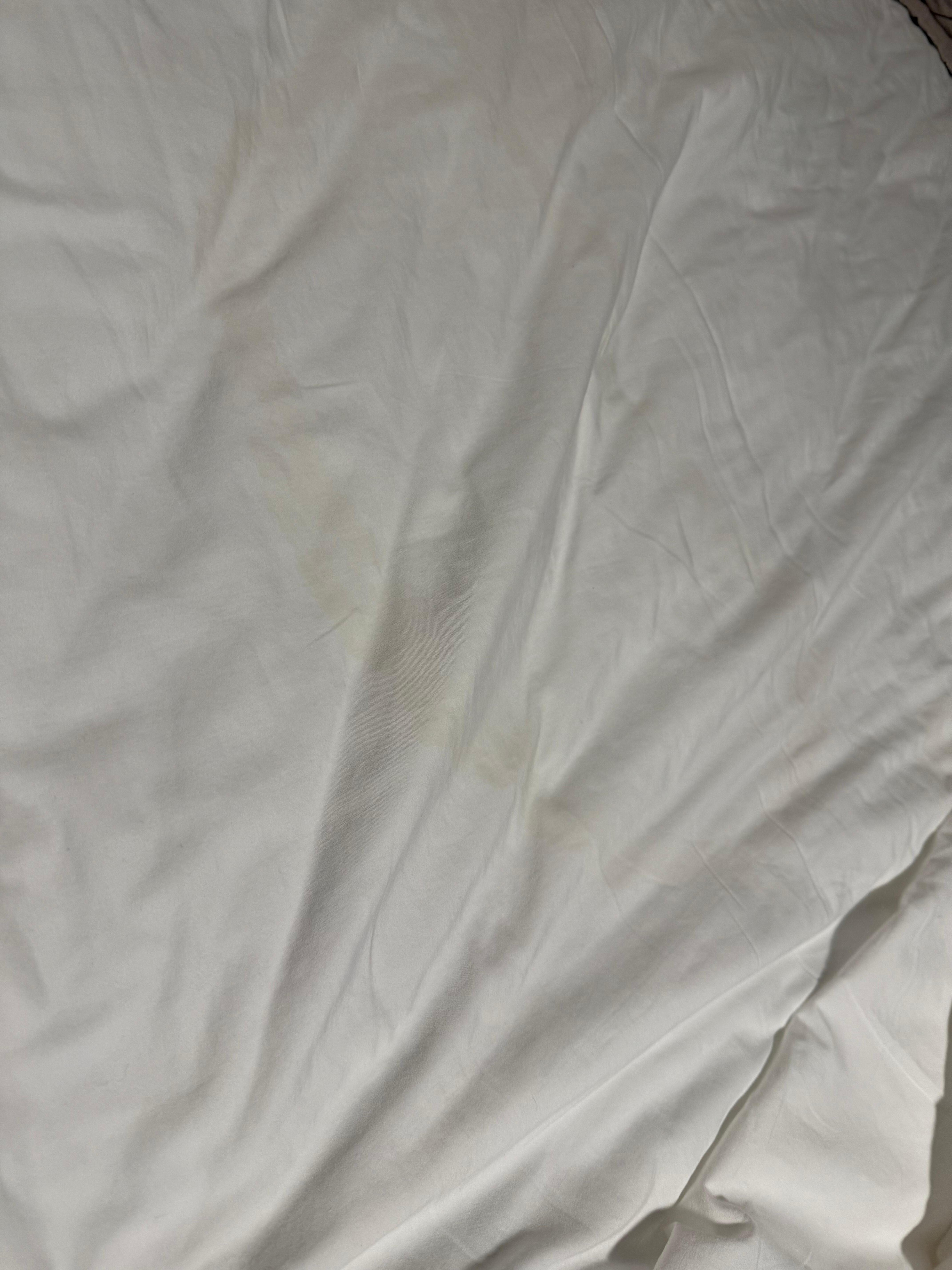 Big yellow stain on sheet, 