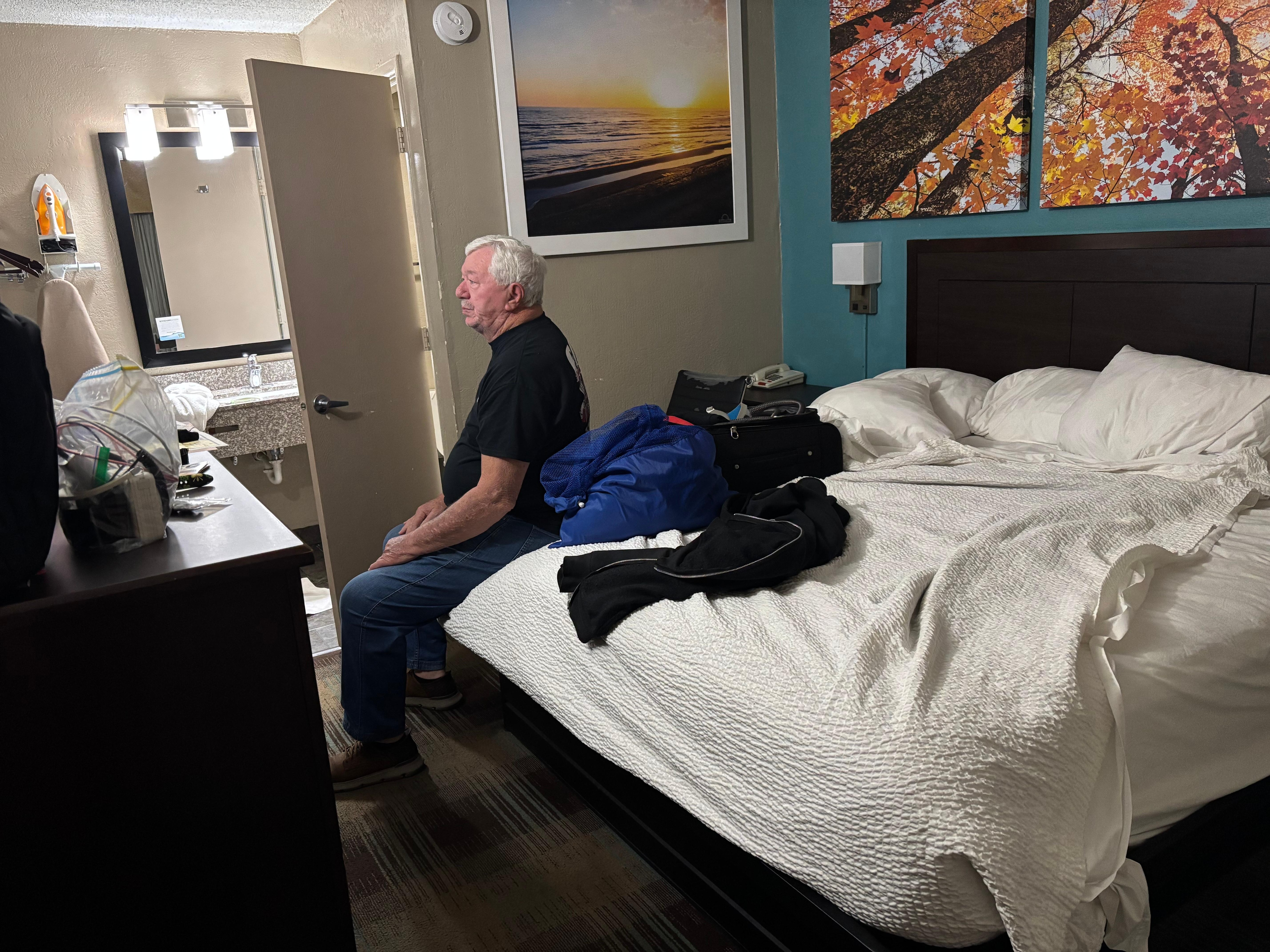 Door opened toward the bed