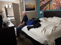 Door opened toward the bed